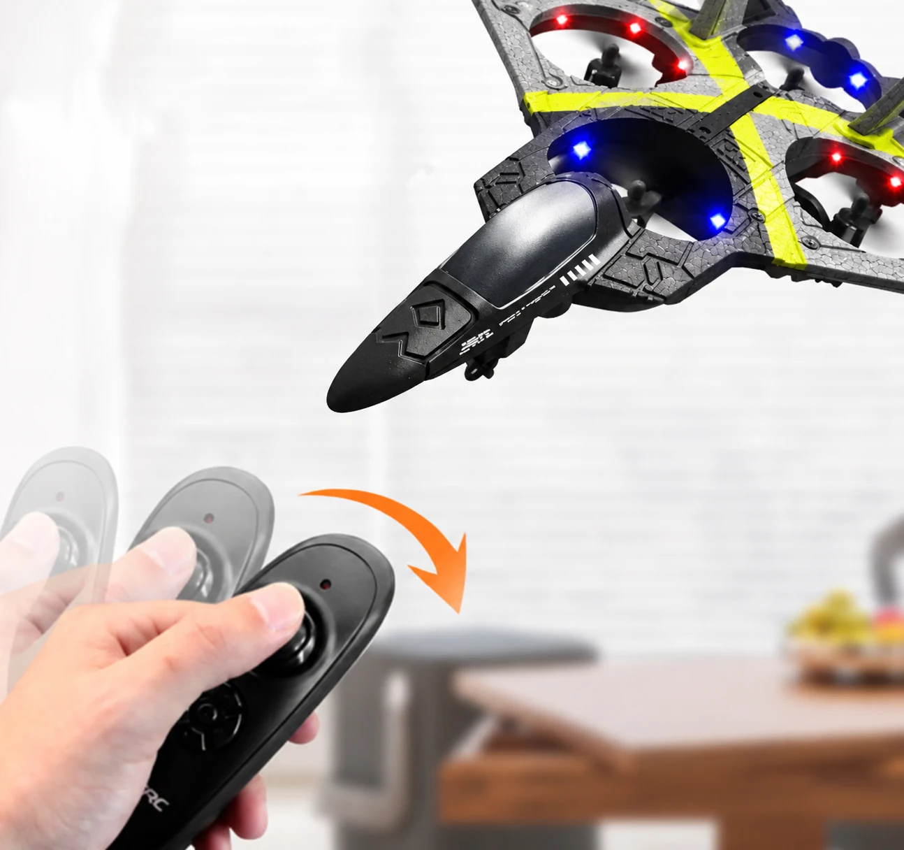 Grey and yellow Steer Falcon with its handheld remote